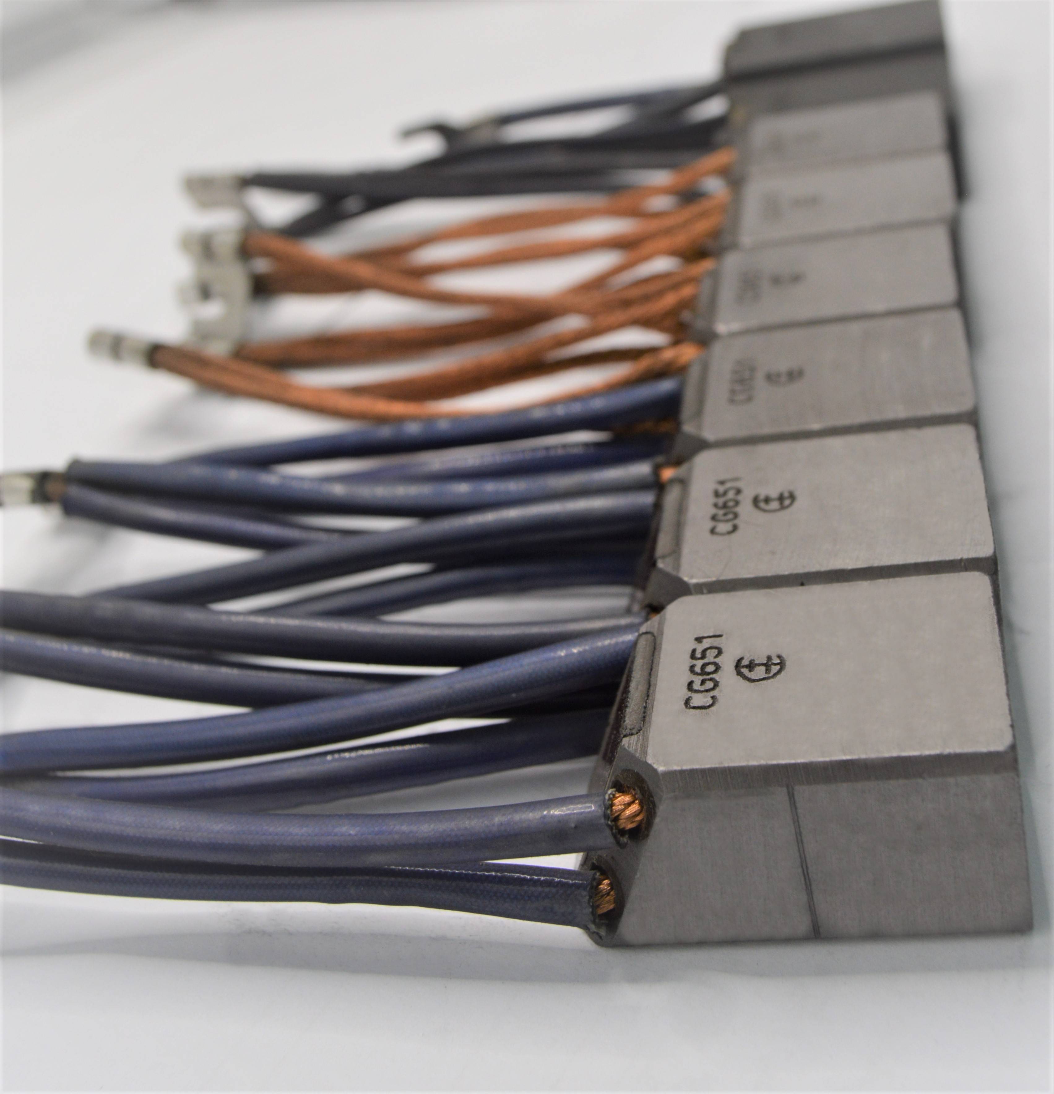 What's the difference between electric and fiber-optic slip rings?